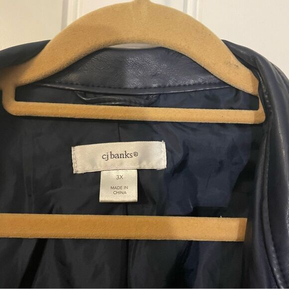 Navy blue, purple is some light. flawed item. Please see picture of spot on neck - Picture 6 of 7